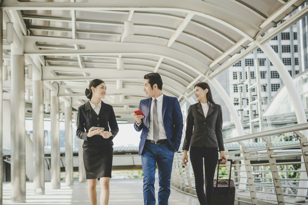 Business man and woman are going on business trip.